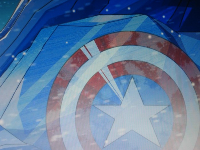 Cap finds his shield buried in the ice...